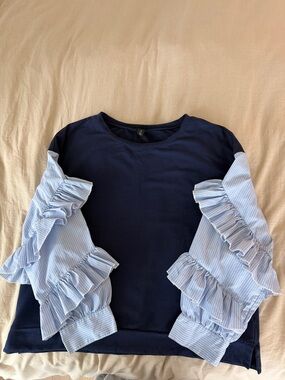 Woman’s Petite Navy Top with Light Blue Ruffle Sleeve Detail